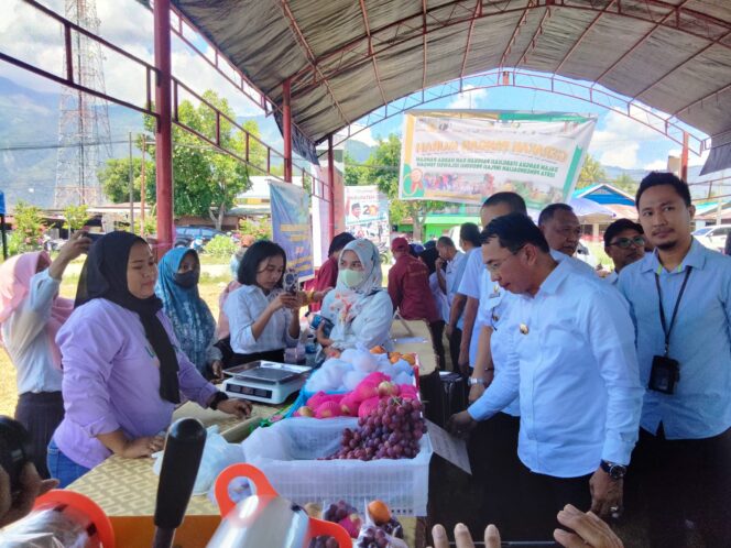 
Kendalikan Inflasi, Dinas Pangan Sulteng gelar Gerakan Pangan Murah di Sigi